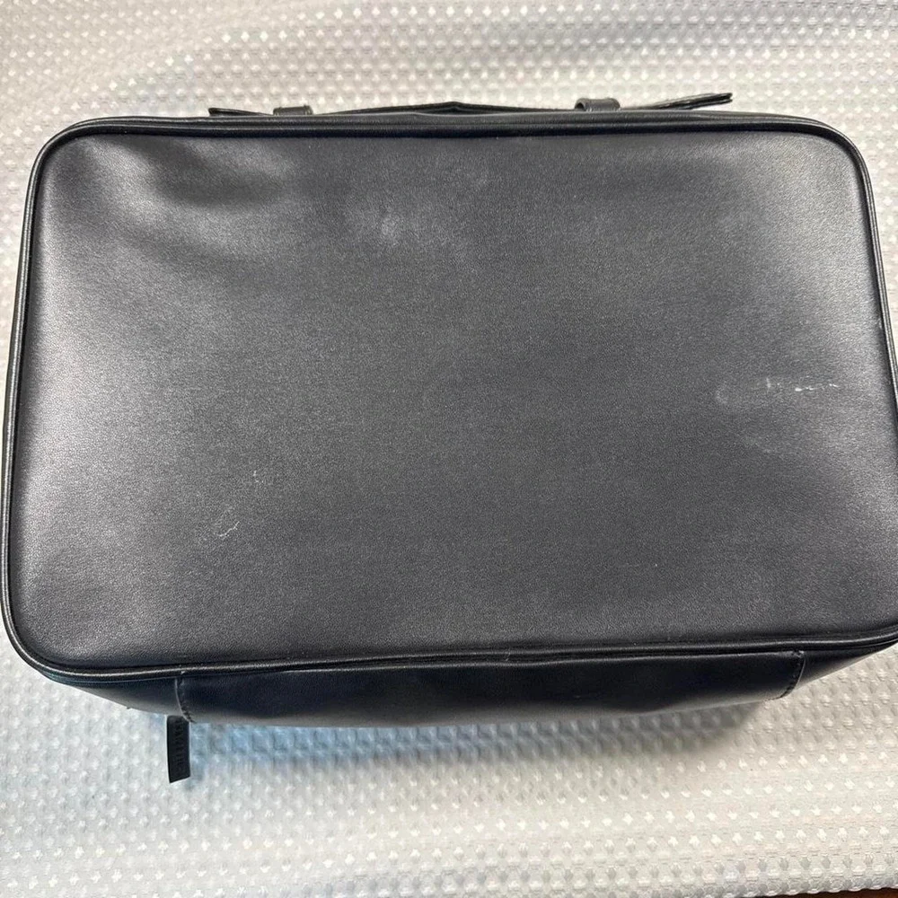 Estee Lauder cosmetic faux leather train case